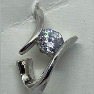 Silver tone Contemporary clear CZ pierced earrings.